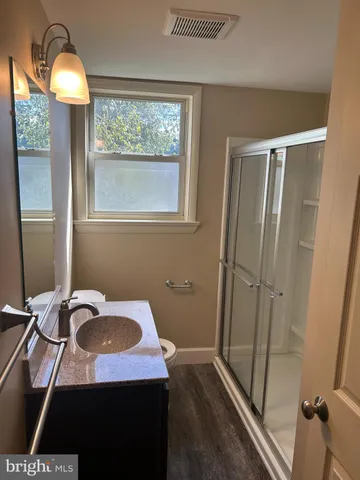 a view of a bathroom with a window