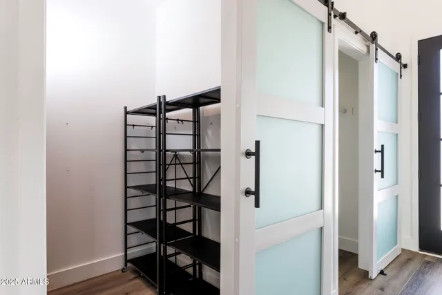 a view of a bathroom with a glass door