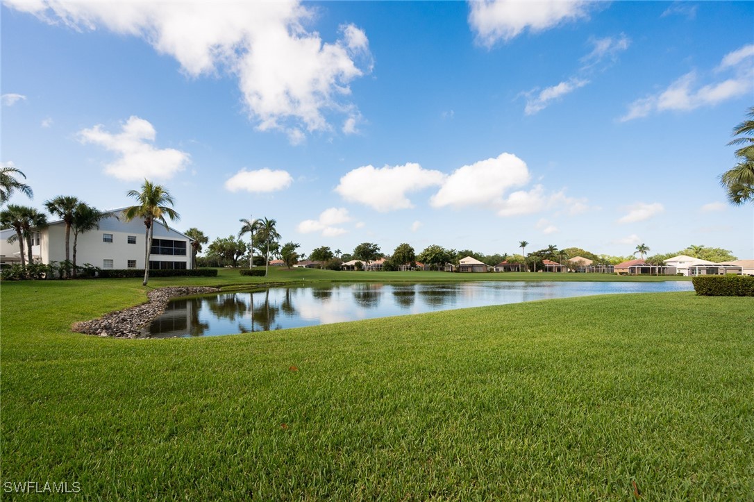 14979 Rivers Edge Court, Unit 223 Fort Myers, FL 33908 - Photo 14 of 18 a view of lake with houses