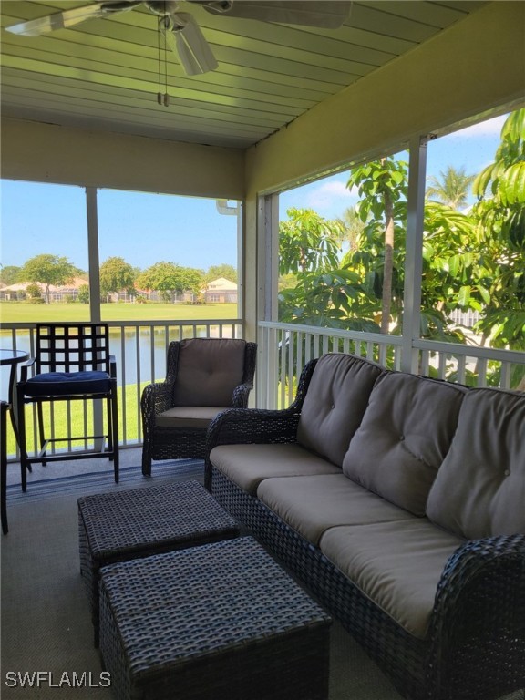 14979 Rivers Edge Court, Unit 223 Fort Myers, FL 33908 - Photo 16 of 18 a roof deck with a couch and a potted plant
