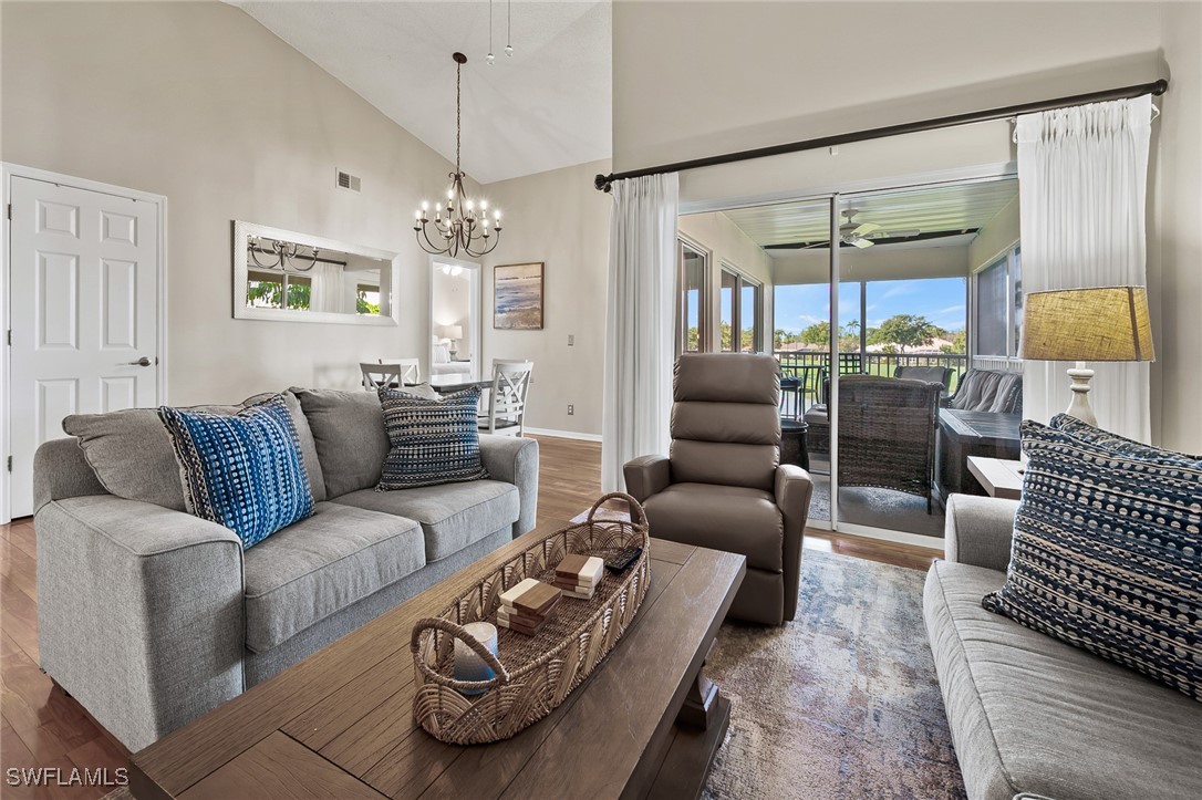 14979 Rivers Edge Court, Unit 223 Fort Myers, FL 33908 - Photo 5 of 18 a living room with furniture ceiling fan and a window