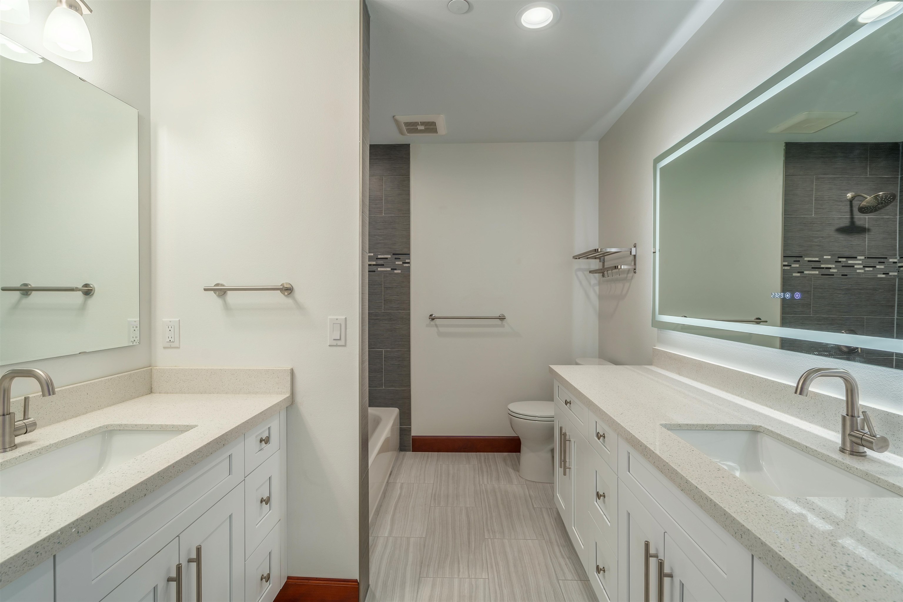 2757 South Kihei Road, Unit 101 Kihei, HI 96753 - Photo 14 of 26 a view of a bathroom sink and a mirror