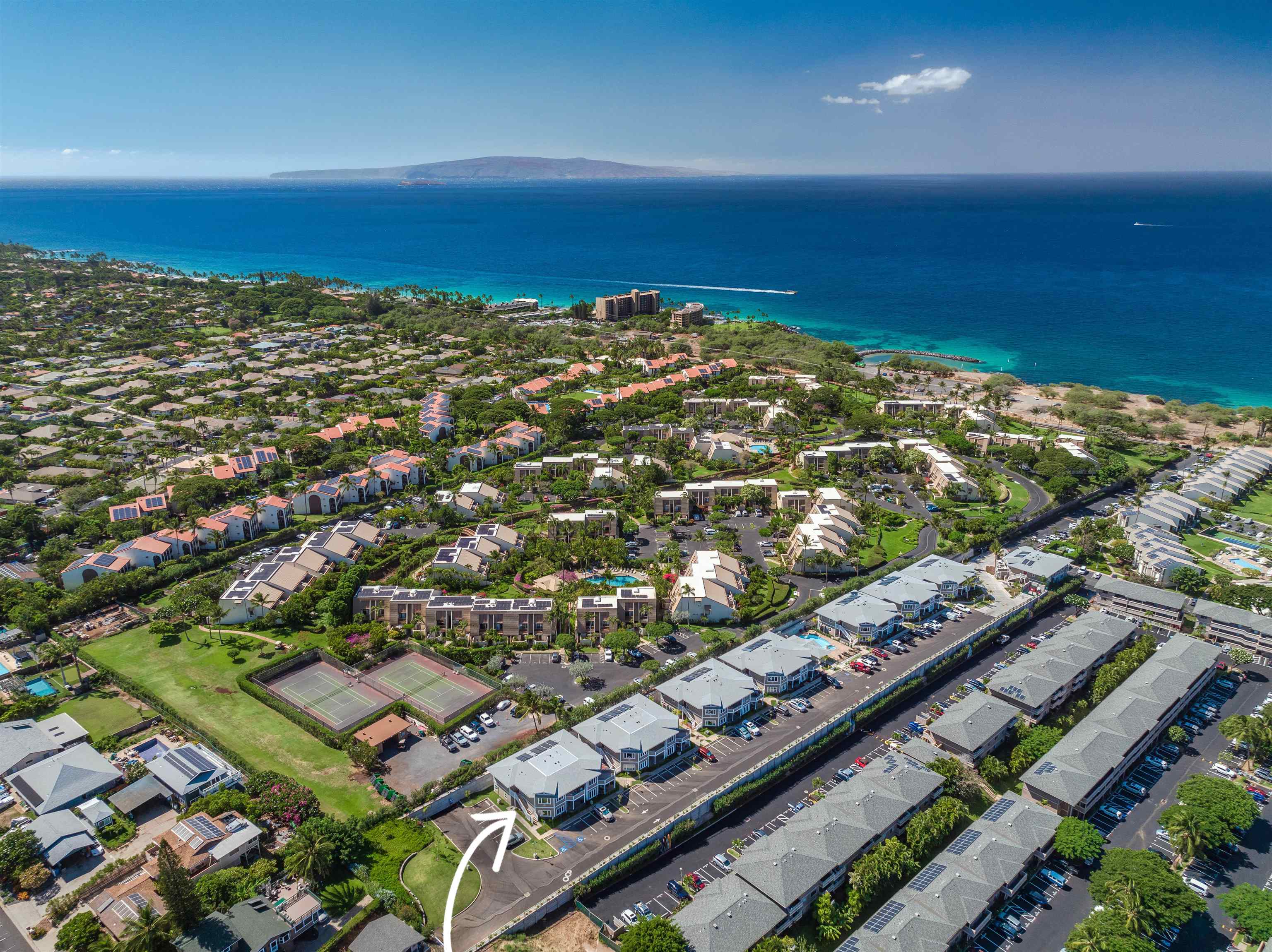 2757 South Kihei Road, Unit 101 Kihei, HI 96753 - Photo 25 of 26 an aerial view of residential building and ocean