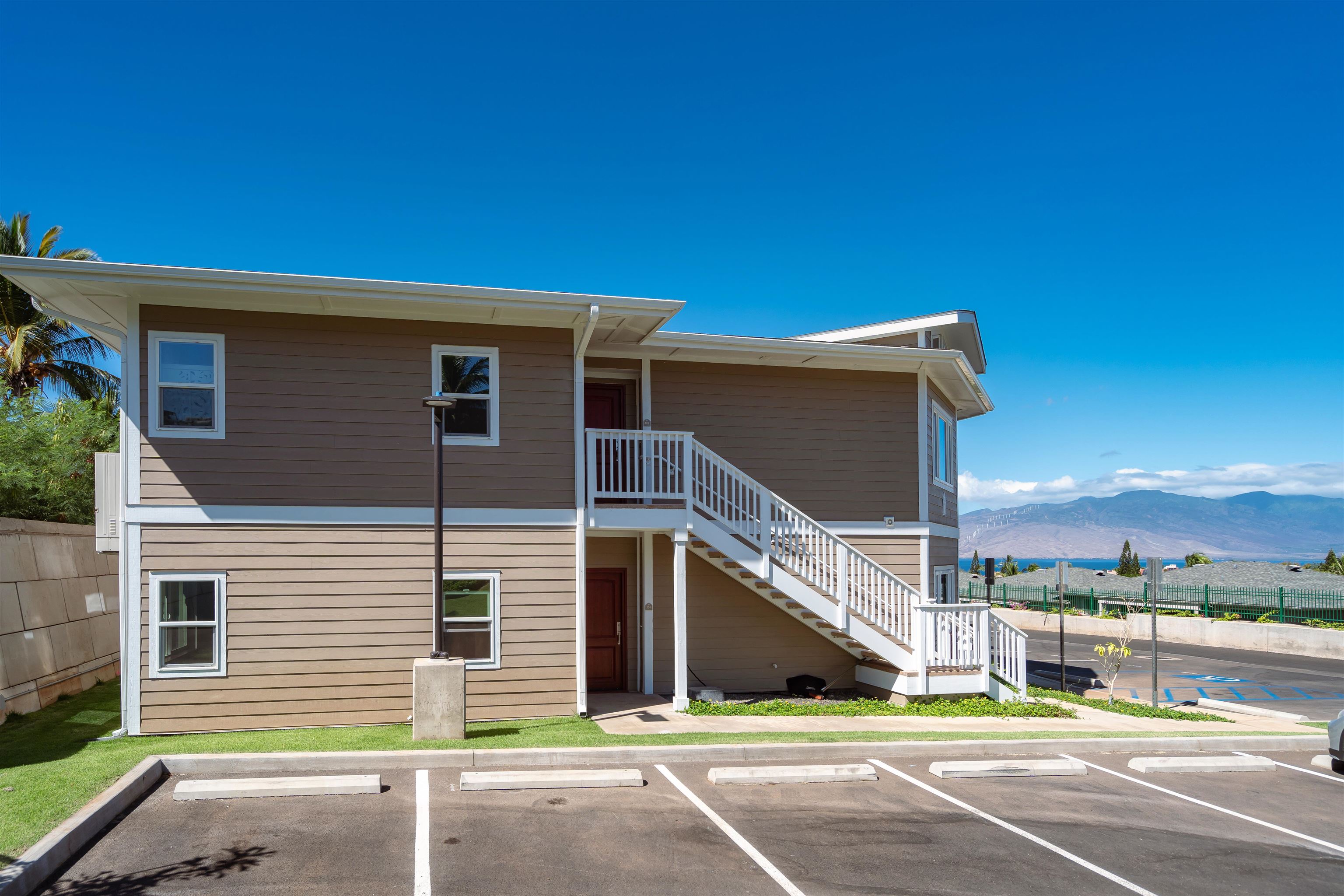 2757 South Kihei Road, Unit 101 Kihei, HI 96753 - Photo 26 of 26 a view of a house with a street