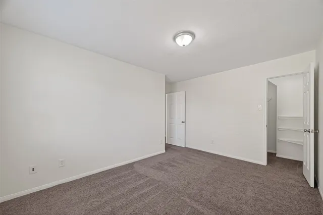 a view of a house with a street