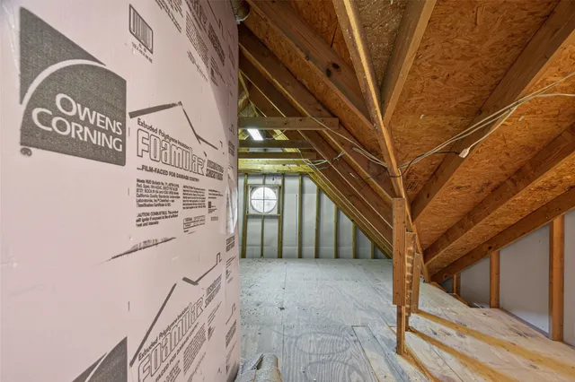 a view of a house with a backyard and a garden