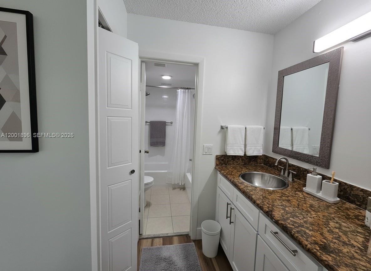 310 Racquet Club Road, Unit 204 Weston, FL 33326 - Photo 26 of 34 AI Staging