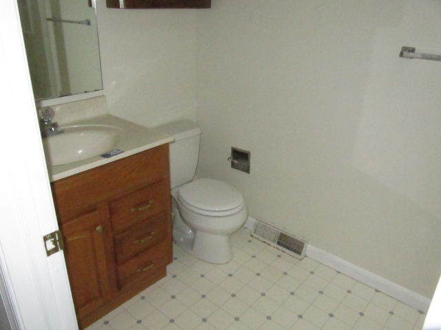 1812 King Richard Road Ferrum, VA 24088 - Photo 10 of 12 a bathroom with a sink and a toilet