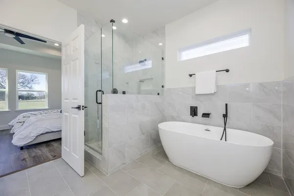 a bathroom with 2 sink and a mirror