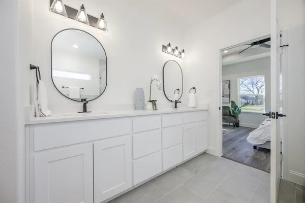 a white bath tub sitting in a bathroom