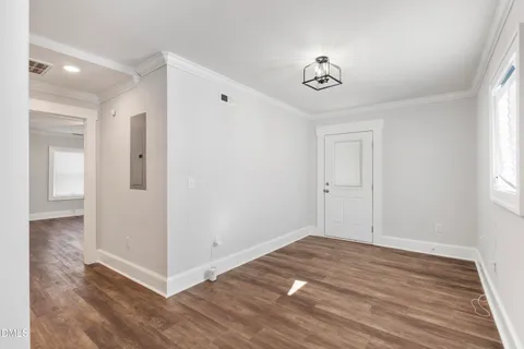 a bathroom with a white bath tub and shower