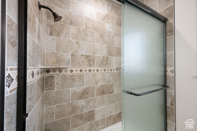 230 Boulder Way Leeds, UT 84746 - Photo 35 of 72 ADU bathroom with a tile shower and glass sliding shower door