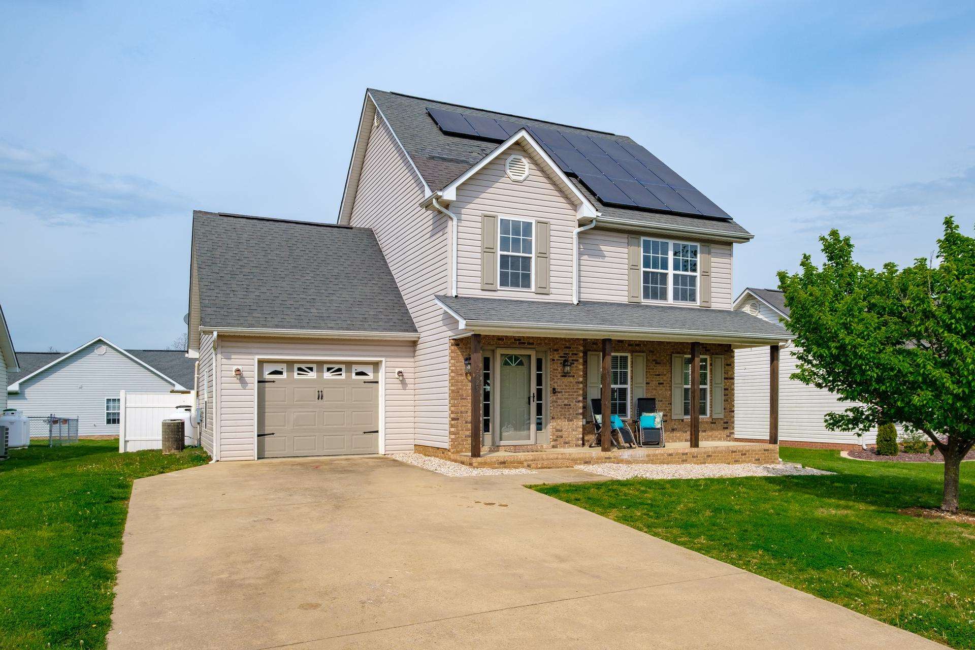 2425 Monroe Street Waynesboro, VA 22980 - Photo 1 of 42 a front view of a house with a yard and garage