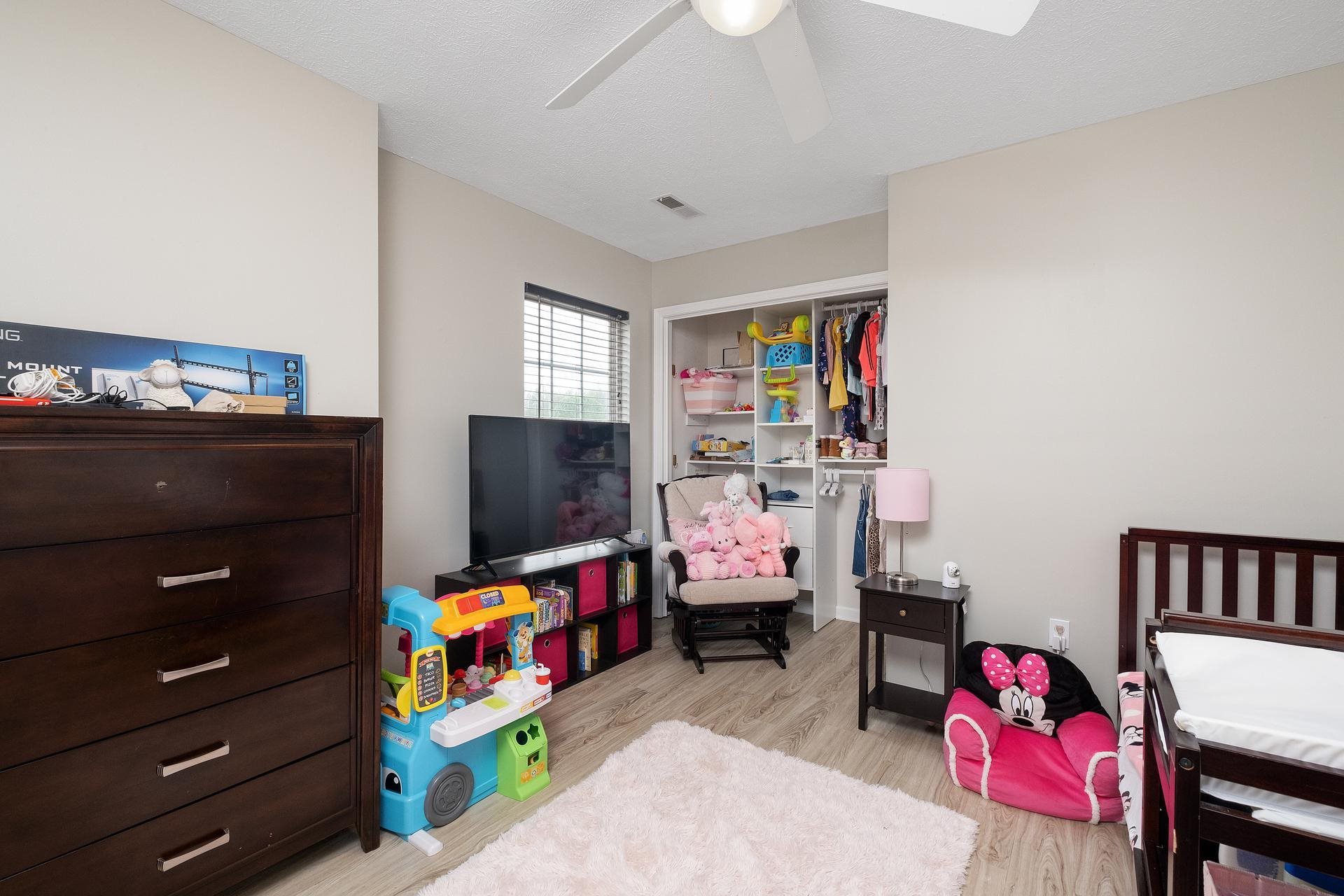 2425 Monroe Street Waynesboro, VA 22980 - Photo 30 of 42 a living room with furniture and a flat screen tv