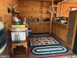 Cozy cabin kitchen with rustic charm.