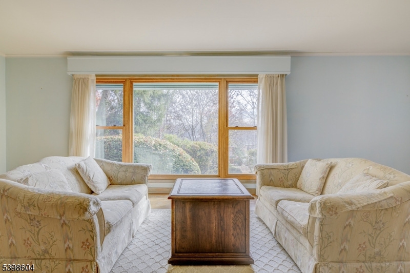 1621 Terrill Road Scotch Plains, NJ 07076 - Photo 11 of 48 a living room with furniture and a window