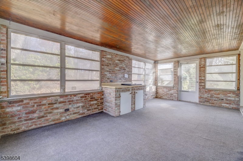 1621 Terrill Road Scotch Plains, NJ 07076 - Photo 18 of 48 a view of an empty room with a window