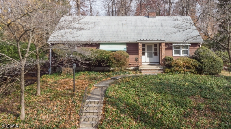 1621 Terrill Road Scotch Plains, NJ 07076 - Photo 3 of 48 a front view of house with yard and green space
