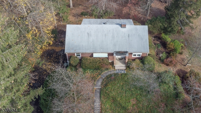 1621 Terrill Road Scotch Plains, NJ 07076 - Photo 33 of 48 an aerial view of a house with a yard and trees