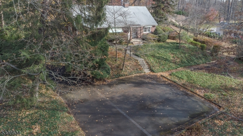 1621 Terrill Road Scotch Plains, NJ 07076 - Photo 34 of 48 a backyard of a house with lots of green space