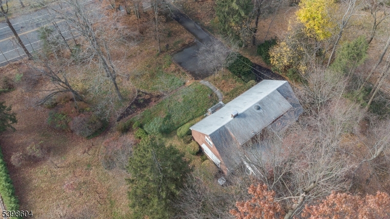 1621 Terrill Road Scotch Plains, NJ 07076 - Photo 36 of 48 with view of a house with a yard