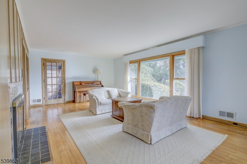 1621 Terrill Road Scotch Plains, NJ 07076 - Photo 8 of 48 a living room with furniture and a large window