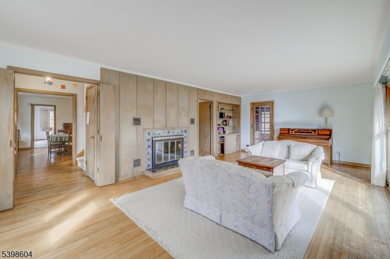 1621 Terrill Road Scotch Plains, NJ 07076 - Photo 9 of 48 a living room with furniture and a wooden floor