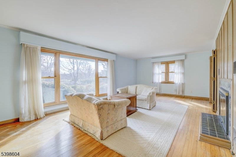 1621 Terrill Road Scotch Plains, NJ 07076 - Photo 10 of 48 a living room with furniture and a large window