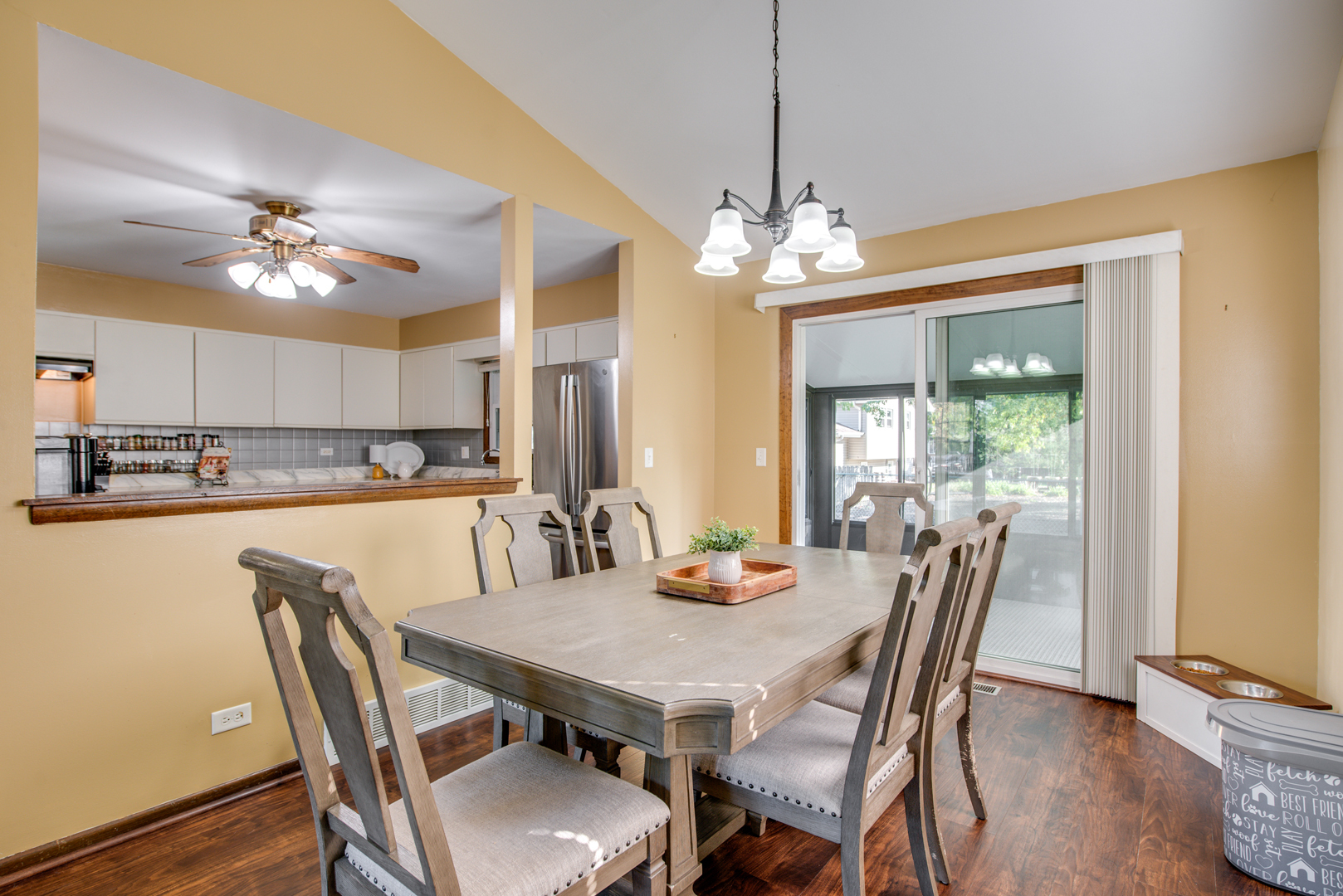 29-w085 Wagner Road Naperville, IL 60564 - Photo 6 of 18 a view of a dining room with furniture window and wooden floor