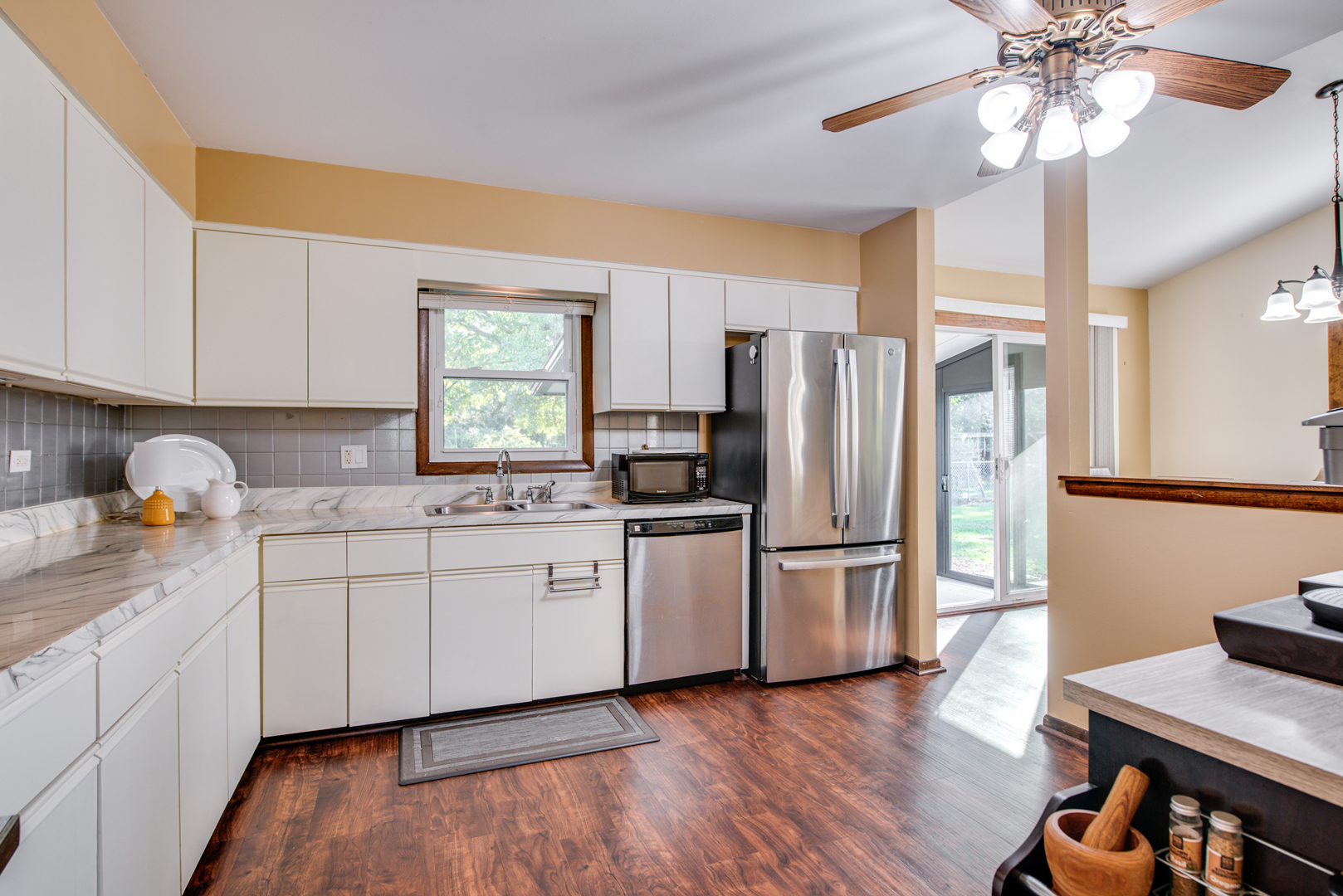 29-w085 Wagner Road Naperville, IL 60564 - Photo 8 of 18 a kitchen with stainless steel appliances a refrigerator sink and cabinets