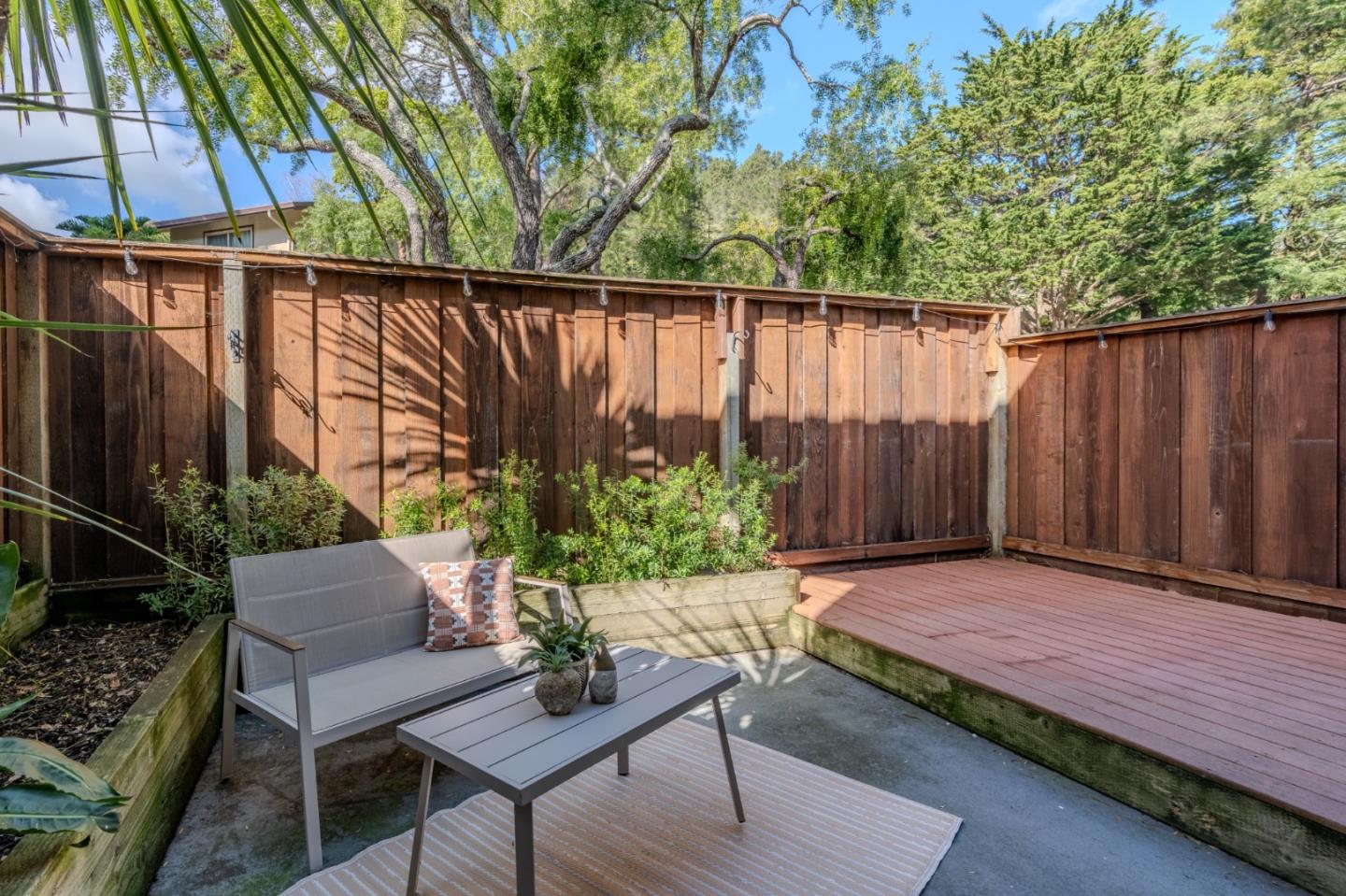 1039 Oddstad Boulevard Pacifica, CA 94044 - Photo 17 of 35 a view of a backyard with furniture