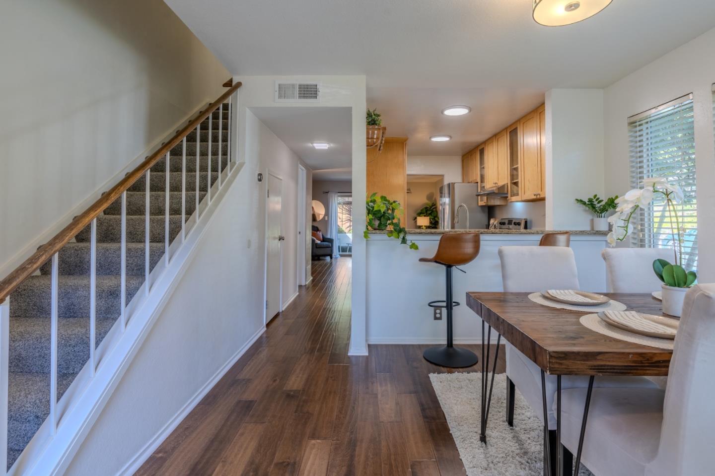 1039 Oddstad Boulevard Pacifica, CA 94044 - Photo 3 of 35 a view of a dining room with furniture window and wooden floor