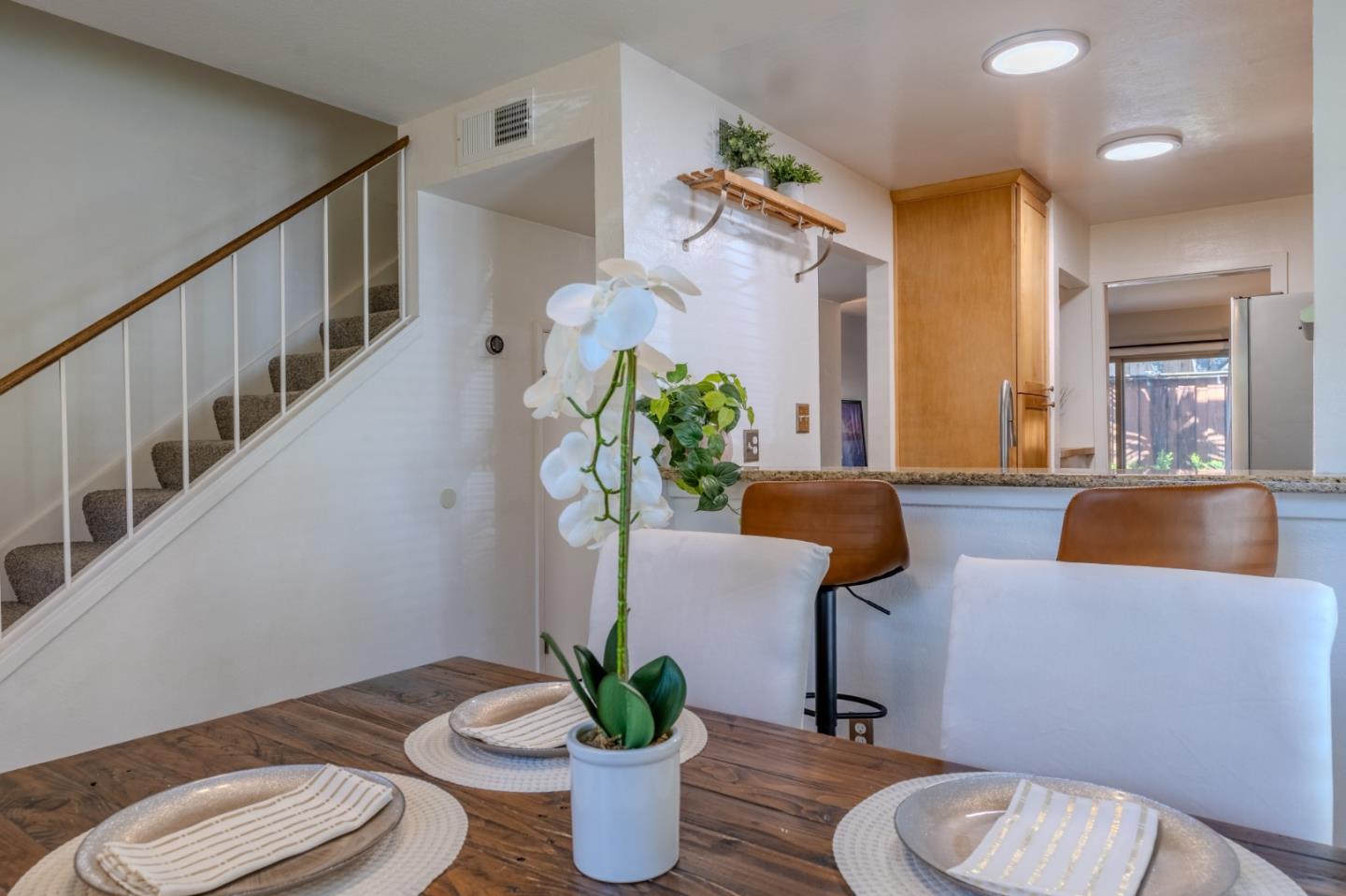 1039 Oddstad Boulevard Pacifica, CA 94044 - Photo 6 of 35 a living room with furniture potted plant and a toilet
