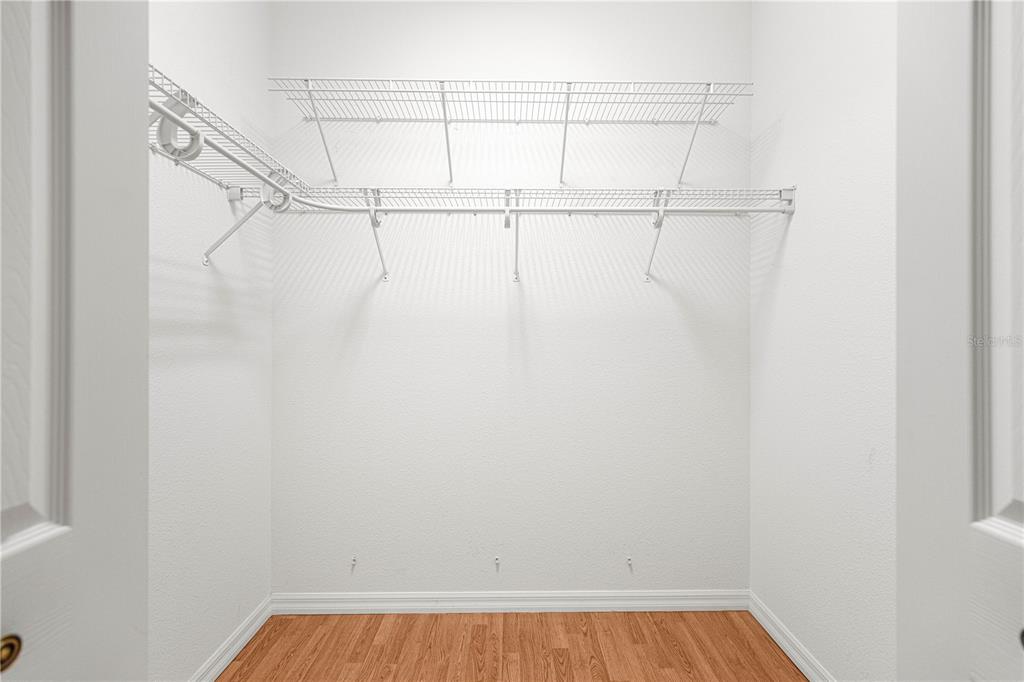 9317 Southwest 94th Loop Ocala, FL 34481 - Photo 20 of 40 a view of a room with racks on the wall