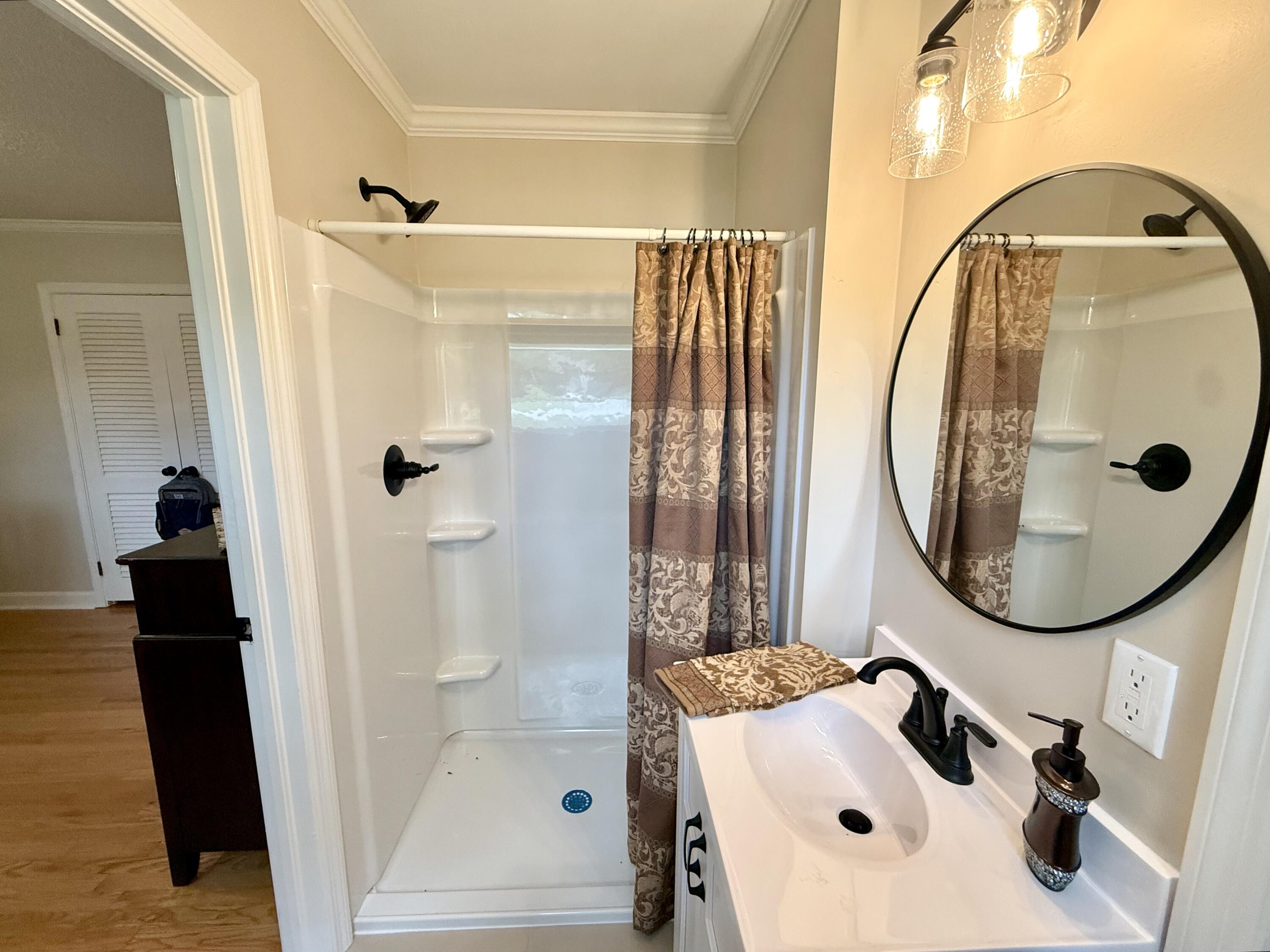 2282 Garrison Street Sumter, SC 29154 - Photo 22 of 43 New shower unit, vanity, and fixtures