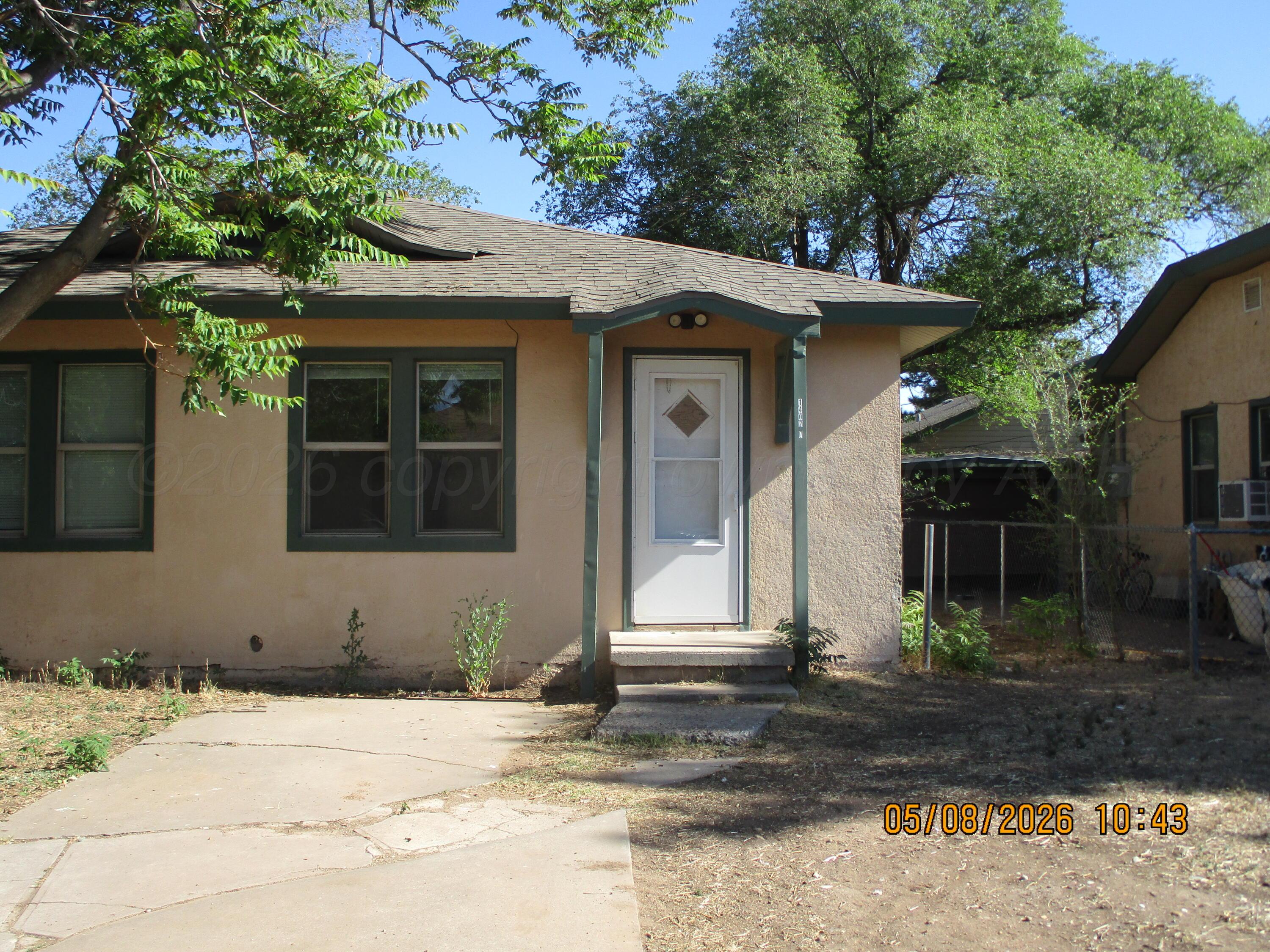 1402 Southwest 13th Avenue Amarillo, TX 79102 - Photo 1 of 13 Front