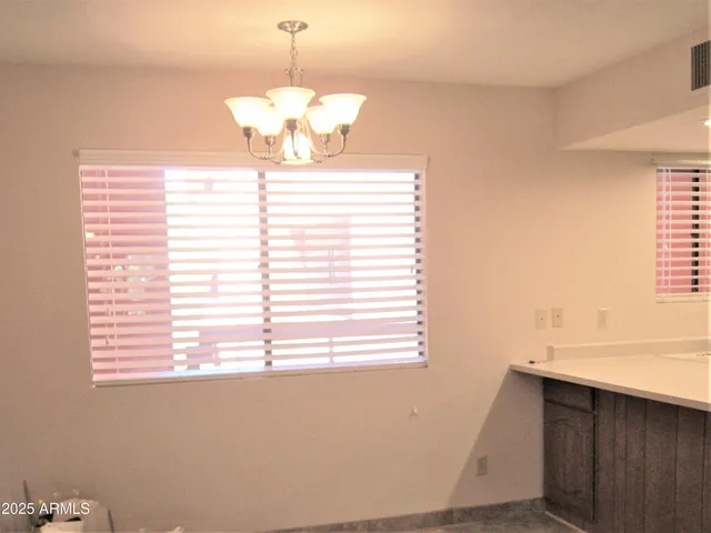 a view of a room with a window