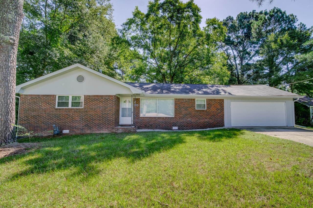 4243 Renda Place, Unit 5 Powder Springs, GA 30127 - Photo 1 of 1 a front view of a house with a yard