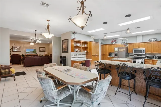 a kitchen with granite countertop lots of counter top space