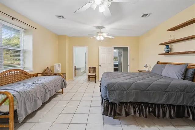 a bathroom with a sink double vanity and shower