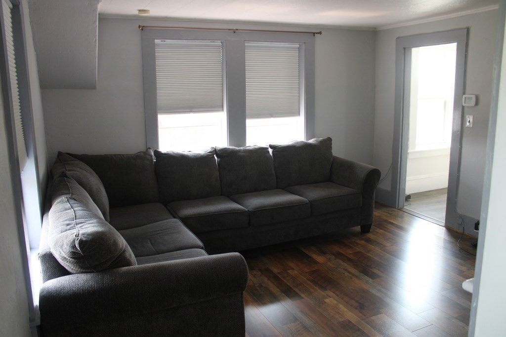 118 Eastern Avenue Gloucester, MA 01930 - Photo 11 of 40 a living room with furniture and a window