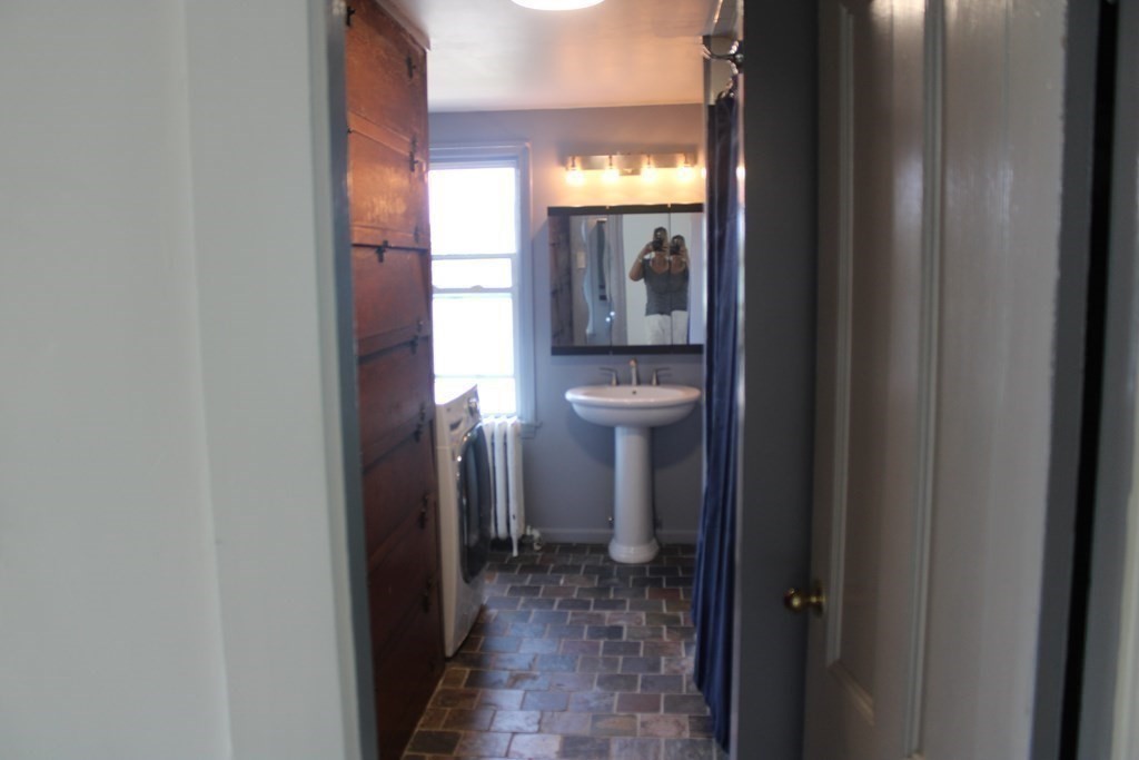 118 Eastern Avenue Gloucester, MA 01930 - Photo 15 of 40 a view of a bathroom from a hallway