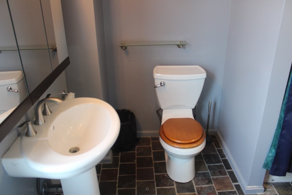118 Eastern Avenue Gloucester, MA 01930 - Photo 18 of 40 a bathroom with a toilet and a sink