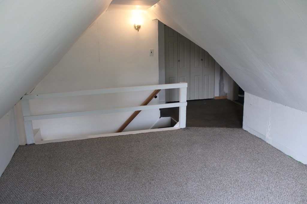 118 Eastern Avenue Gloucester, MA 01930 - Photo 19 of 40 a view of an empty room with stairs