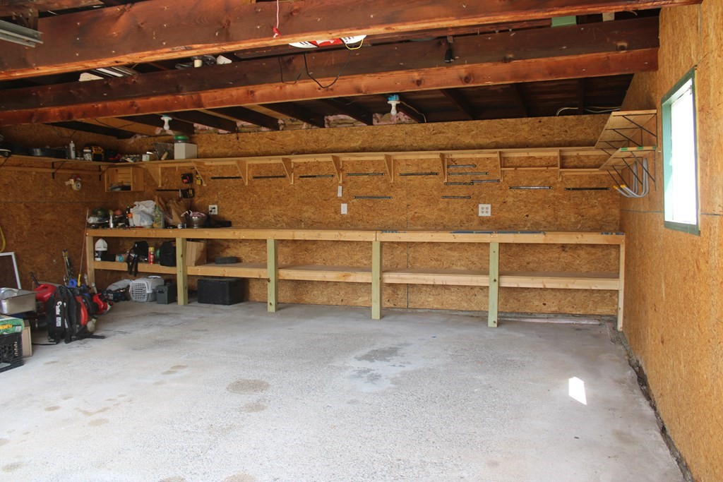 118 Eastern Avenue Gloucester, MA 01930 - Photo 5 of 40 a view of an empty room with empty shelves