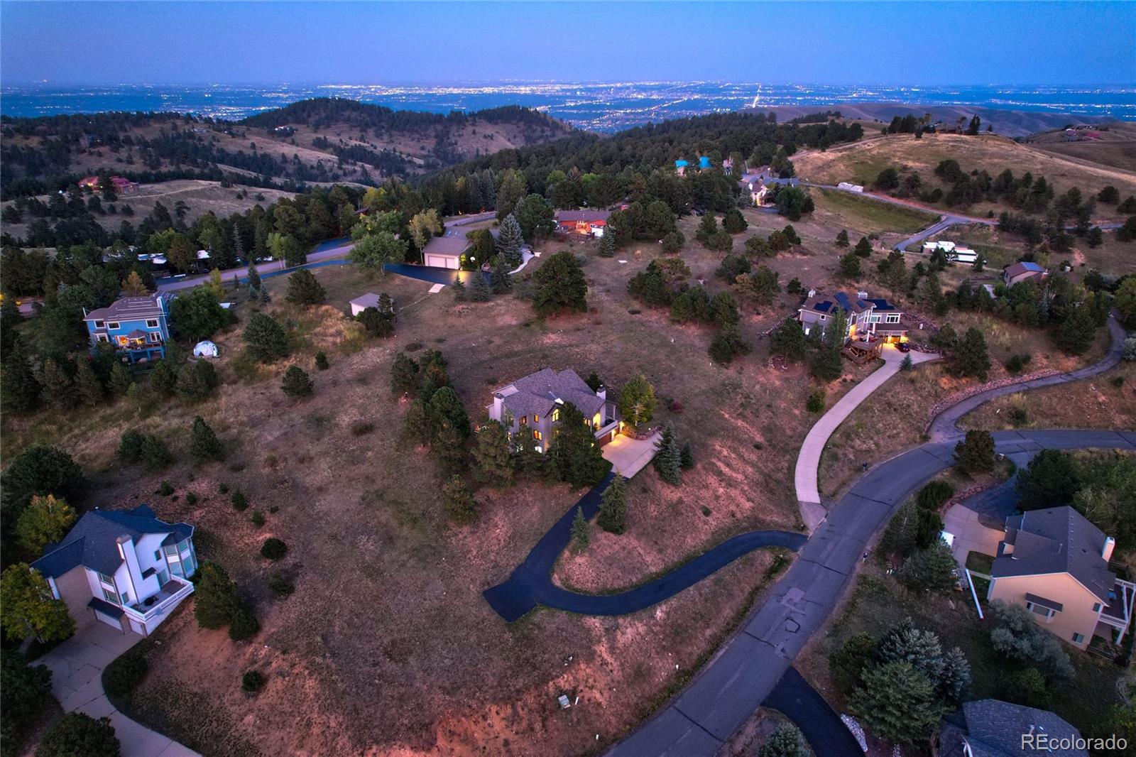 386 Monte Vista Road Golden, CO 80401 - Photo 1 of 32 a view of a house with a yard