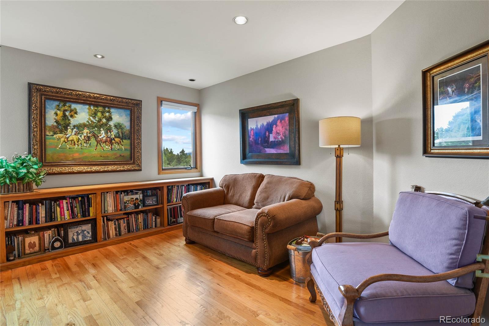 386 Monte Vista Road Golden, CO 80401 - Photo 25 of 32 a living room with furniture and a window