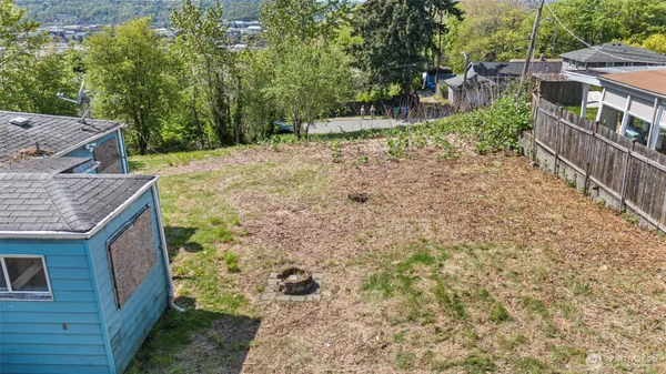 a backyard of a house with lots of green space