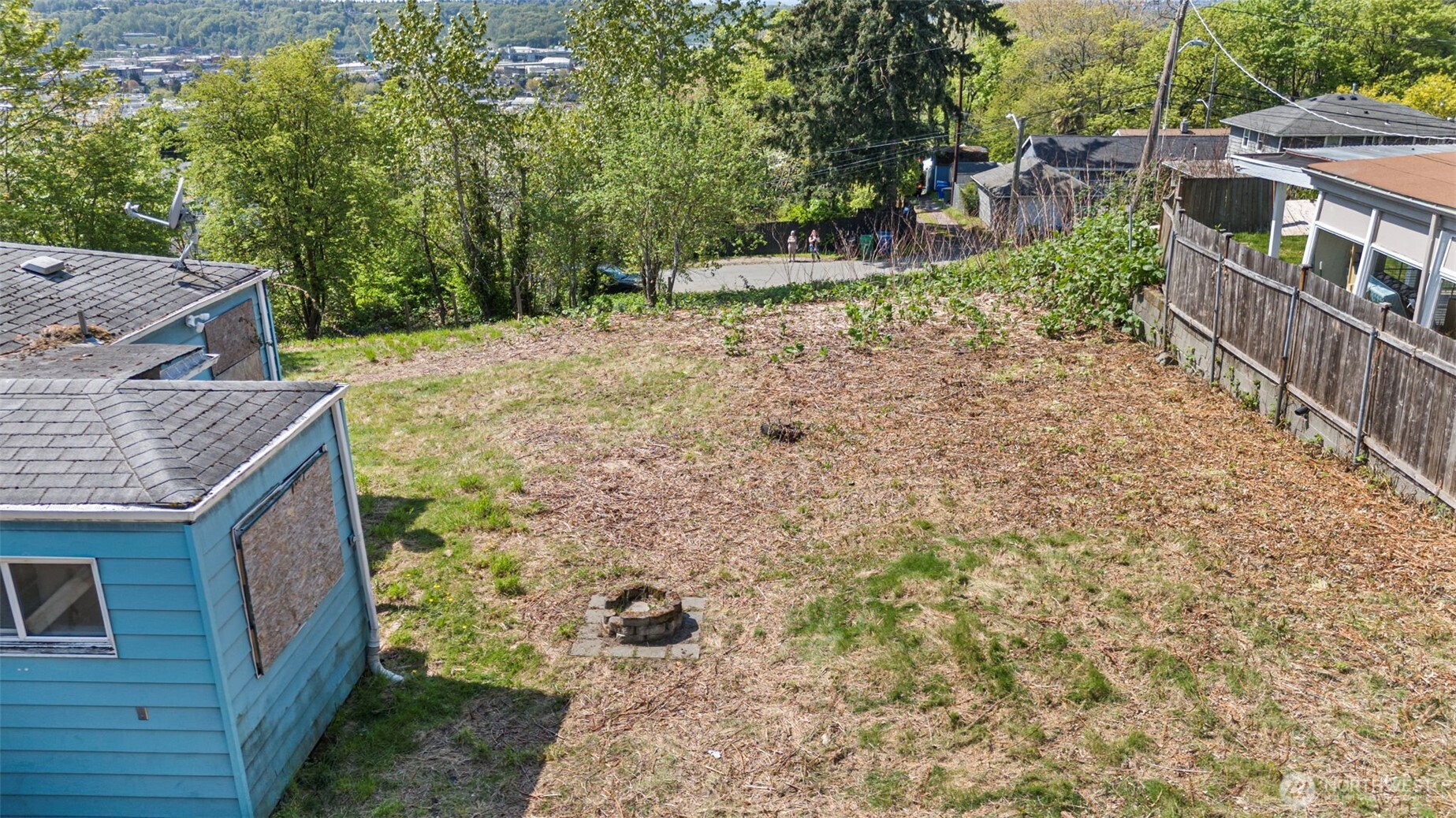 2356 South Graham Street Seattle, WA 98108 - Photo 12 of 19 a backyard of a house with lots of green space