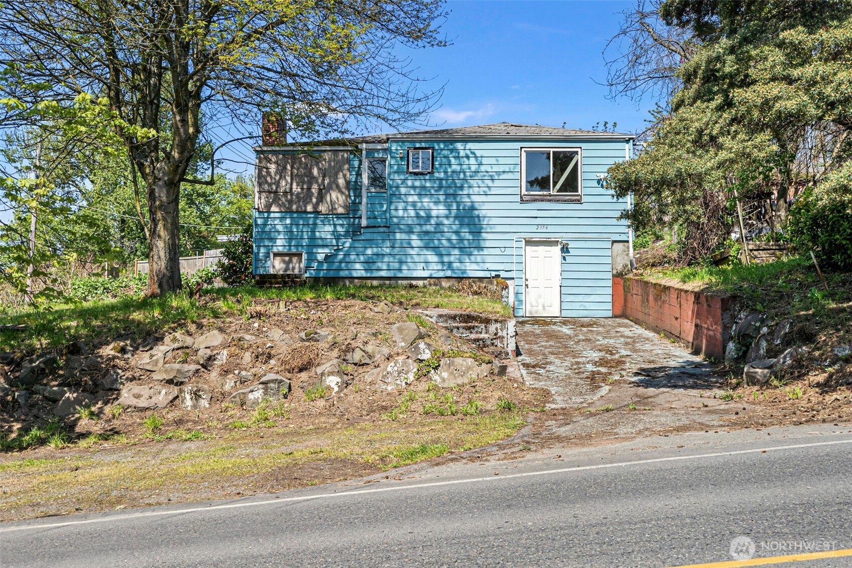 2356 South Graham Street Seattle, WA 98108 - Photo 4 of 19 front view of a house with a yard